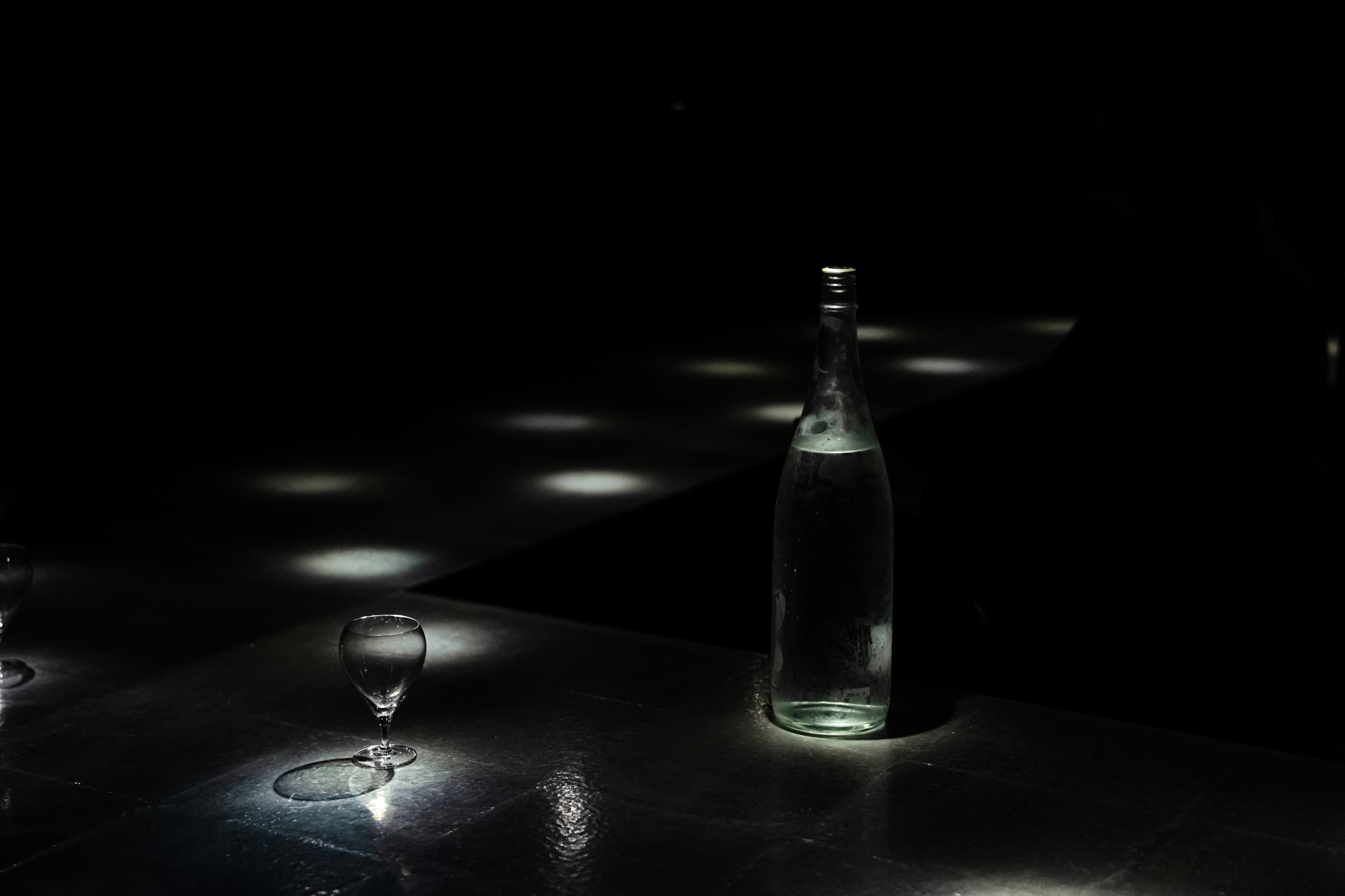 A Solitude of Bottle and Glass